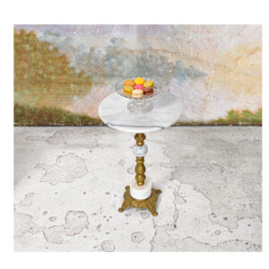 Small pedestal table with marble top and metal base