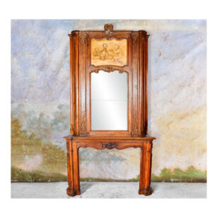 Antique oak mantel with cherubs overmantel