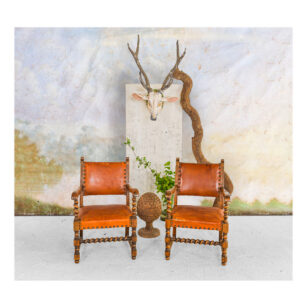 Pair of 1940s beechwood armchairs Covered in leather